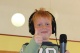 Kind mit Kopfhörern und Mikrofon